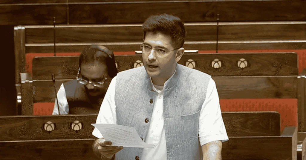 Raghav Chadha speaking in Rajya Sabha, holding a paper during his AI access proposal speech.